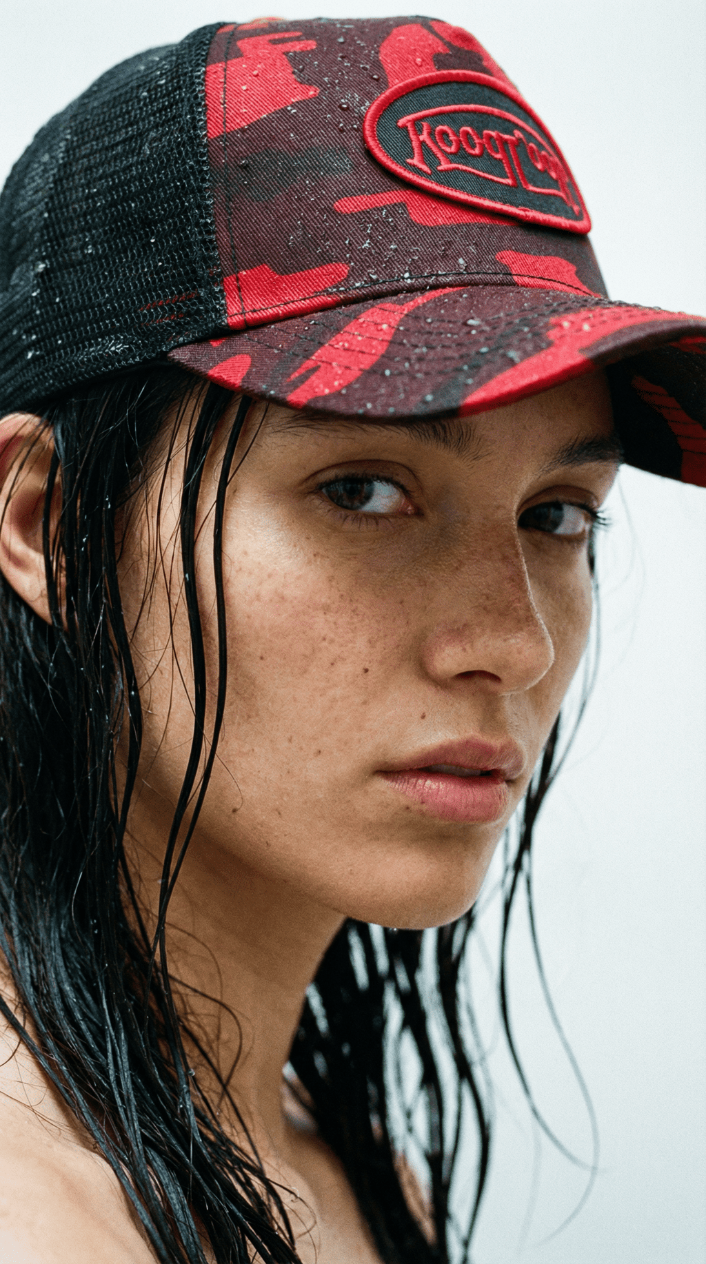 AI product shot of Von Dutch Red Rambo Camo Trucker Hat