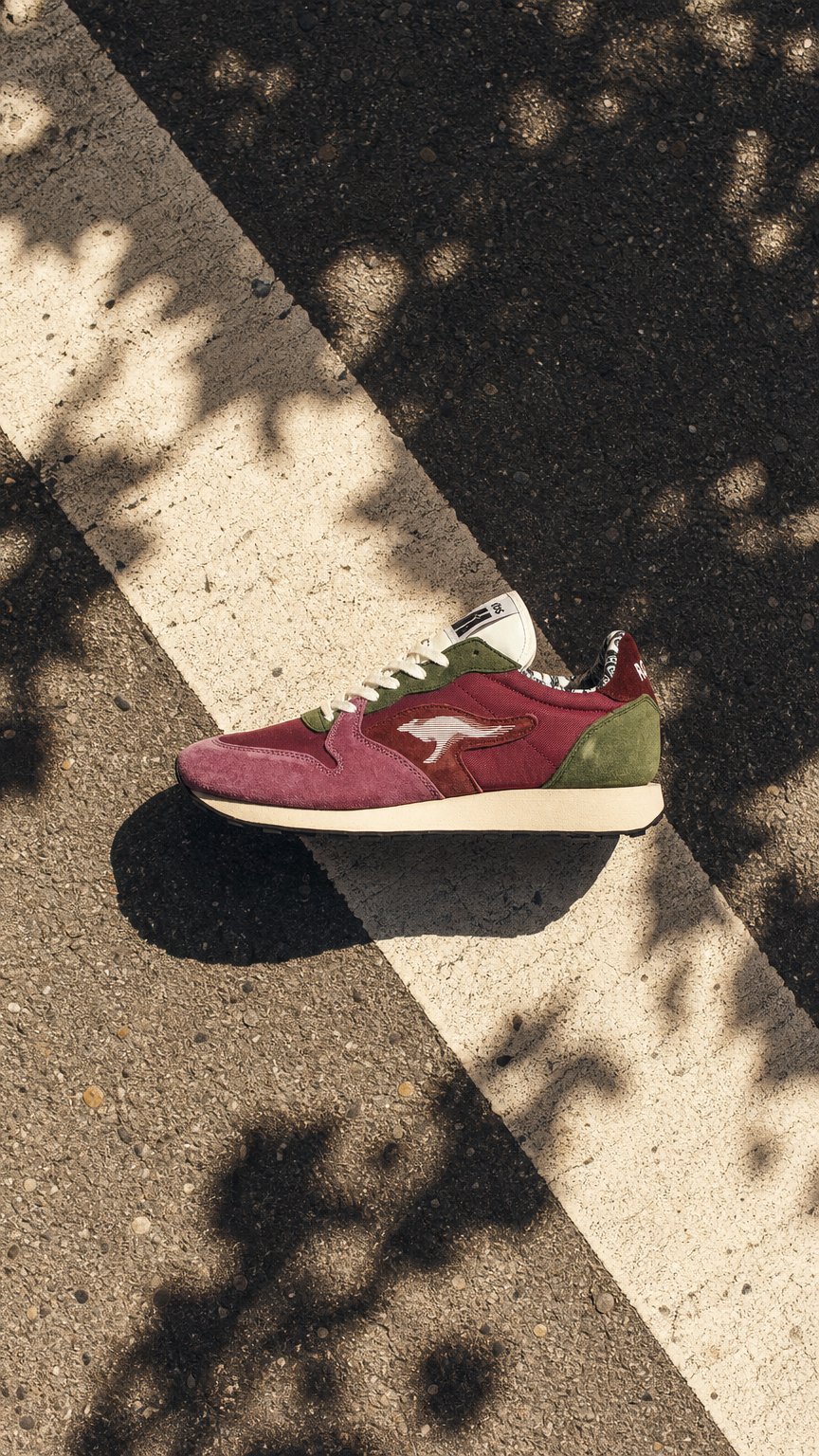 AI product shot of Kangaroos Rally Bandana Berry/Dark Green