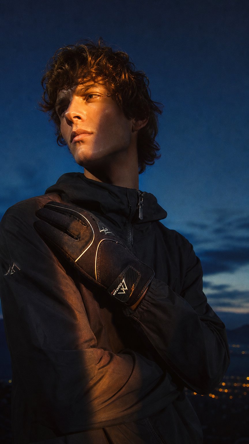 AI product shot of Peak Glove-Fully lined, water resistant, reflective piping on the back of hand, Velcro wrist closure.