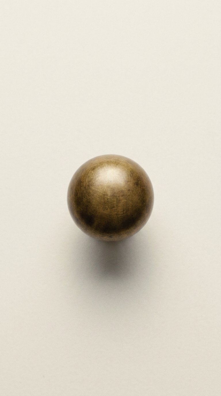 AI product shot of Surrey Knob - Acid Washed Brass