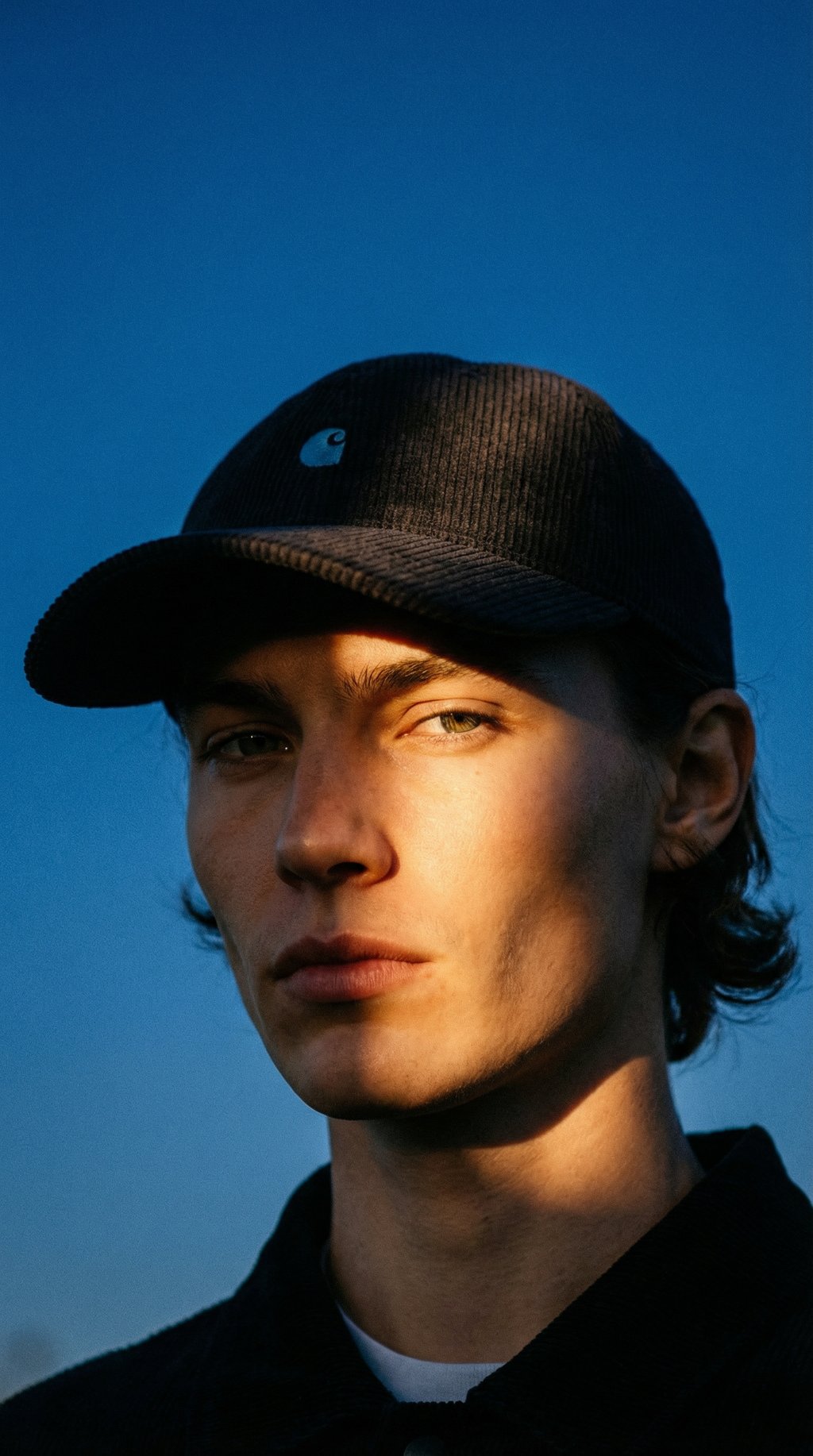 AI product shot of Carhartt WIP Harlem Cap Dark Navy/White
