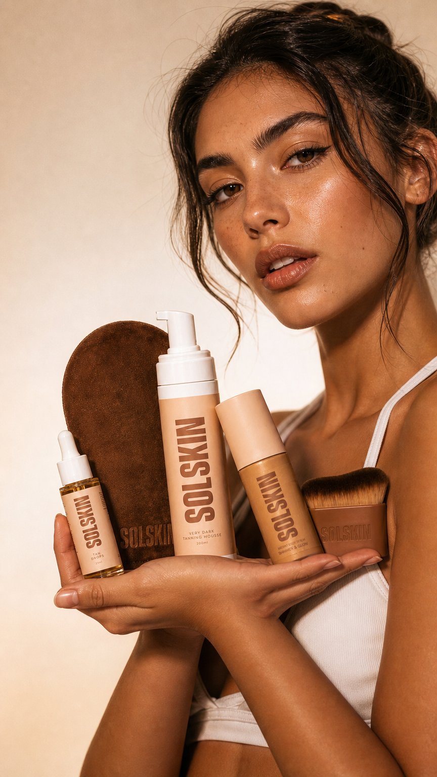 AI product shot of Tan Mousse, Drops, Shimmer, Mitt & Brush