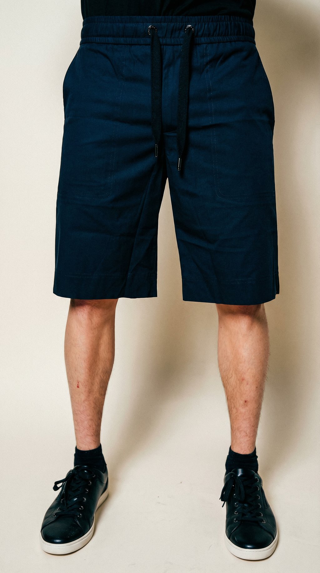 AI product shot of Dolce & Gabbana Dark Blue Cotton Bermuda Sweatshorts Shorts