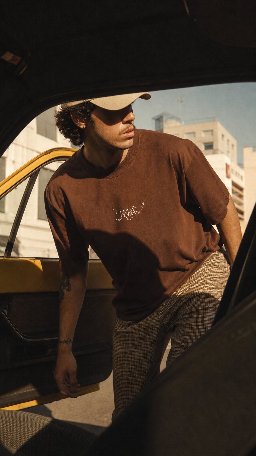 AI product shot of T-SHIRT “MYSTERIES OF LIFE” BROWN