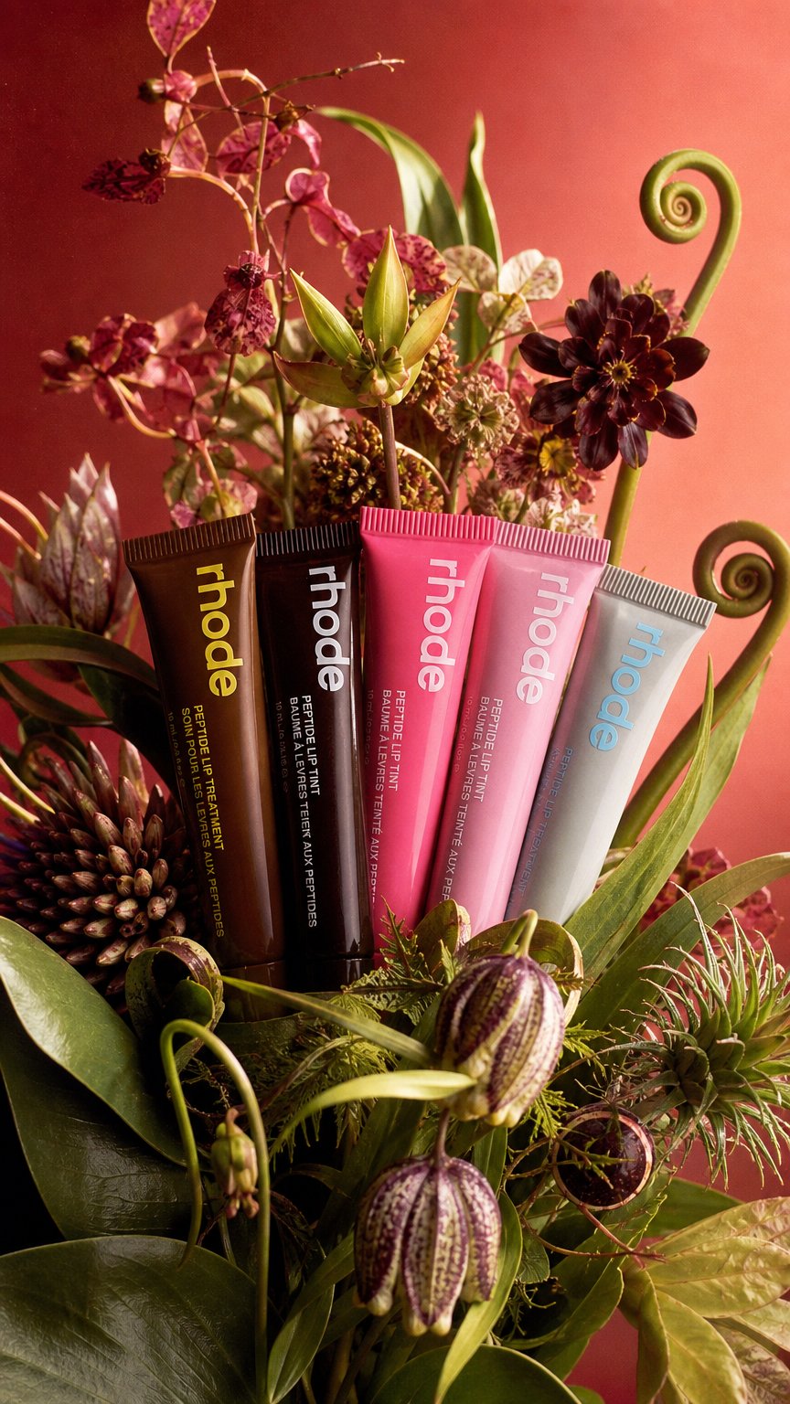 AI product shot of Rhodeskin Spring Lip Gloss Lip Balm Smoothing Lipstick Lines Lasting Nourishing Women Daily Care Makeup Moisturizer Blush Girl