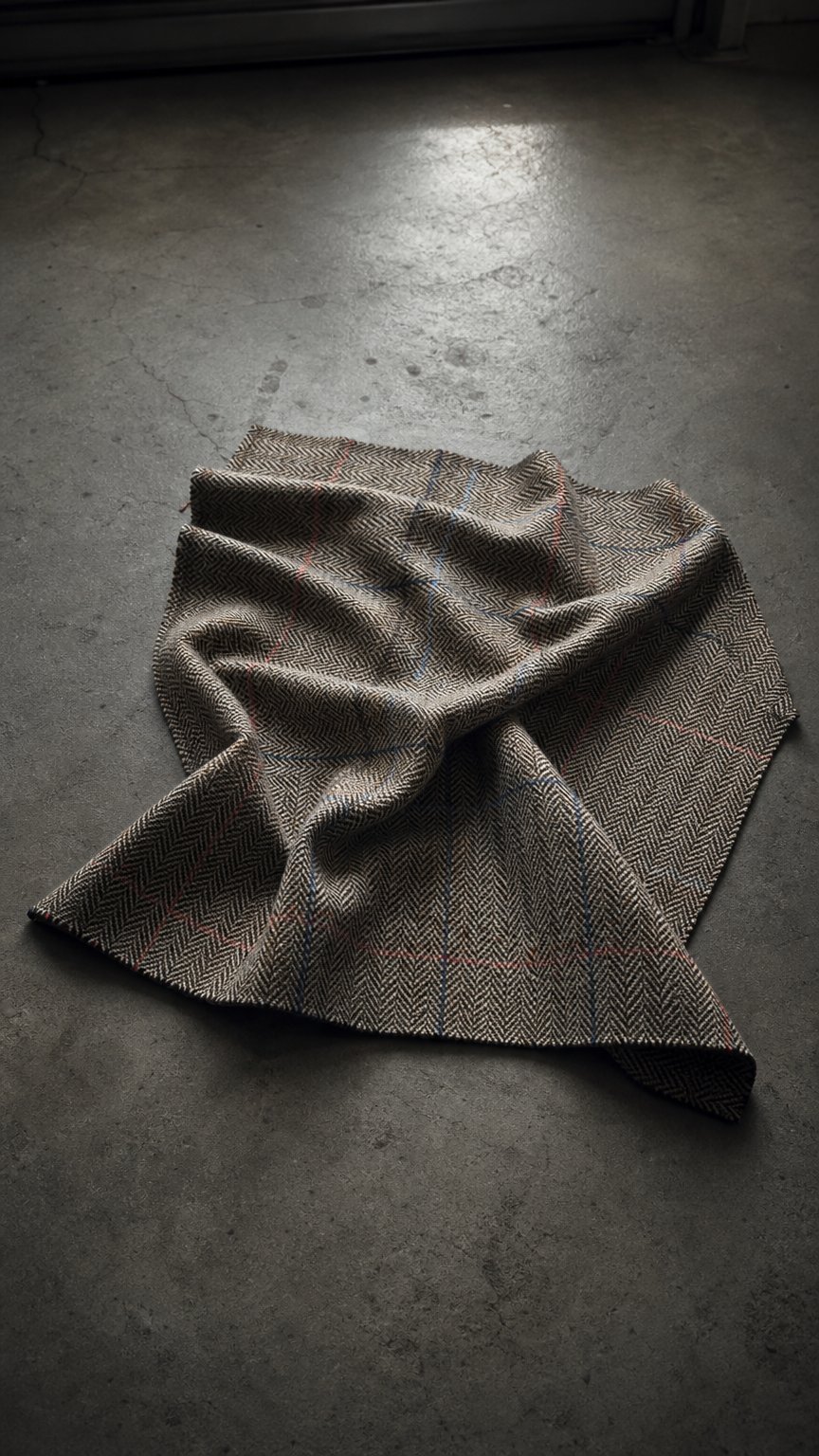 AI product shot of PF185 - Herringbone Check Yorkshire Tweed - Fawn/Blue/Red