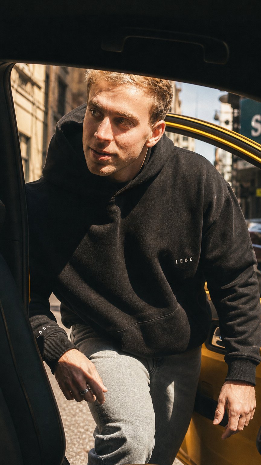 AI product shot of The Polar Fleece Hoodie - Midnight Black
