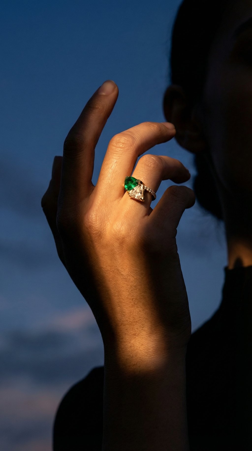 AI product shot of Emerald and Diamond Trillion North South Shield Ring