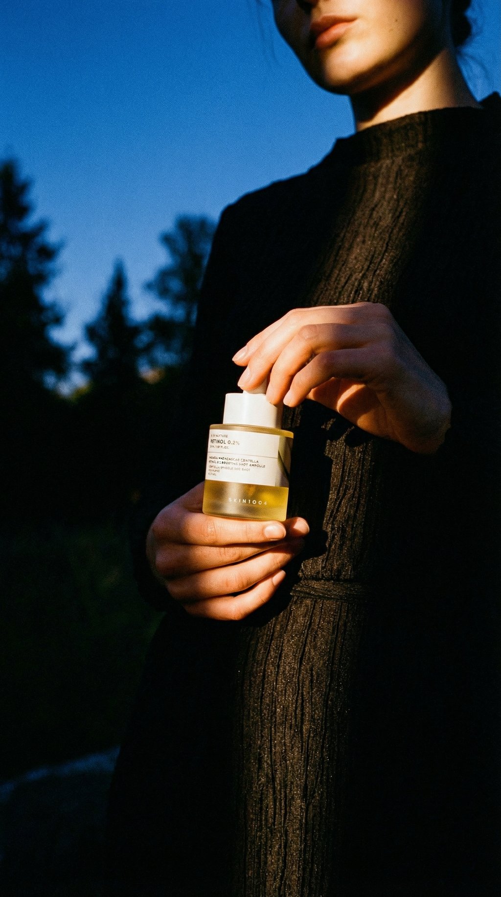 AI product shot of SKIN1004 Madagascar Centella Retinol 0.2 Boosting Shot Ampoule