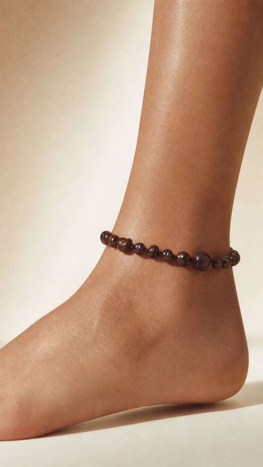AI product shot of Adult Cherry Amber Anklet         (Amber Therapy)