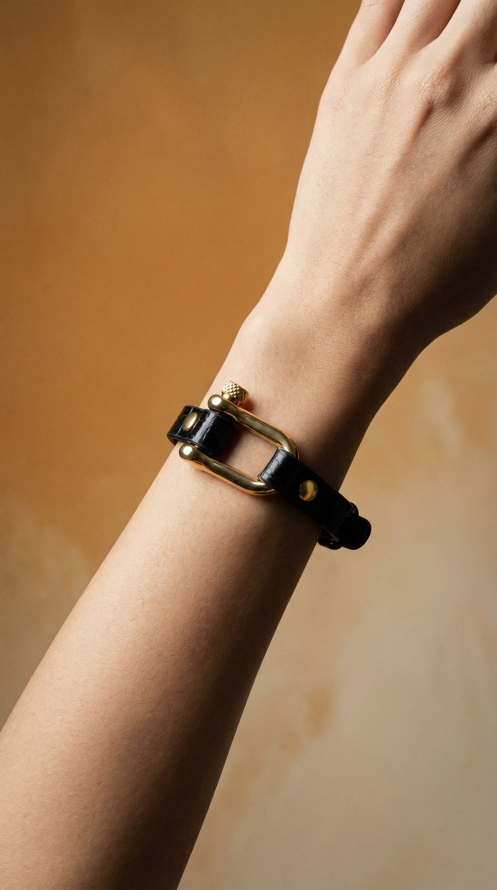 AI product shot of Black Crocodile & Gold Shackle Bracelet