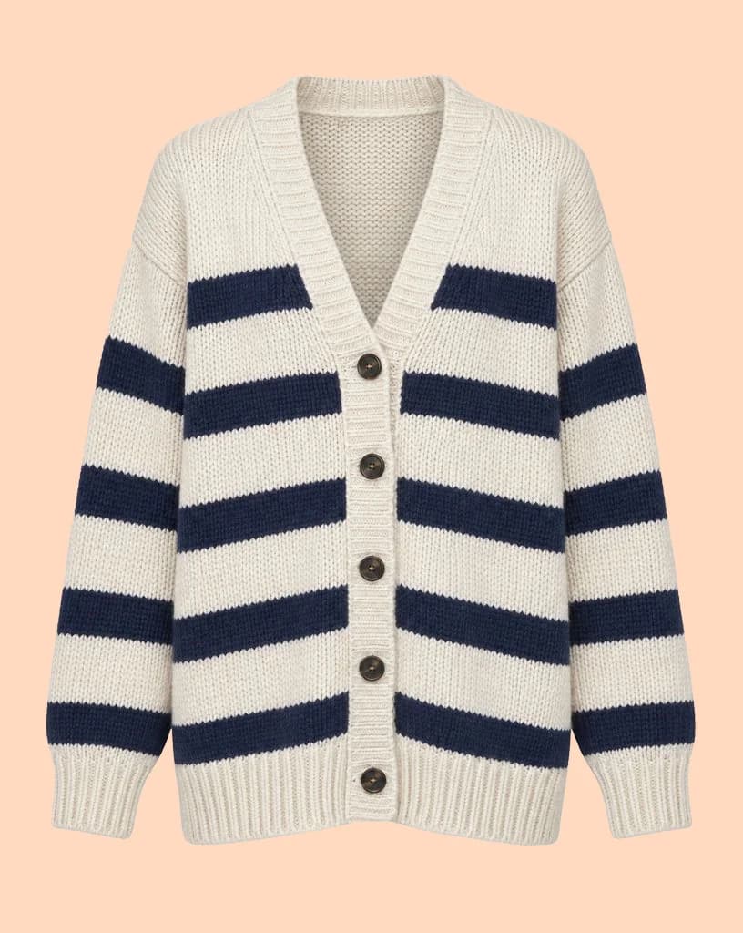 Cream cardigan with navy stripes on a gray backdrop, and the same cardigan on a flat peach background - After
