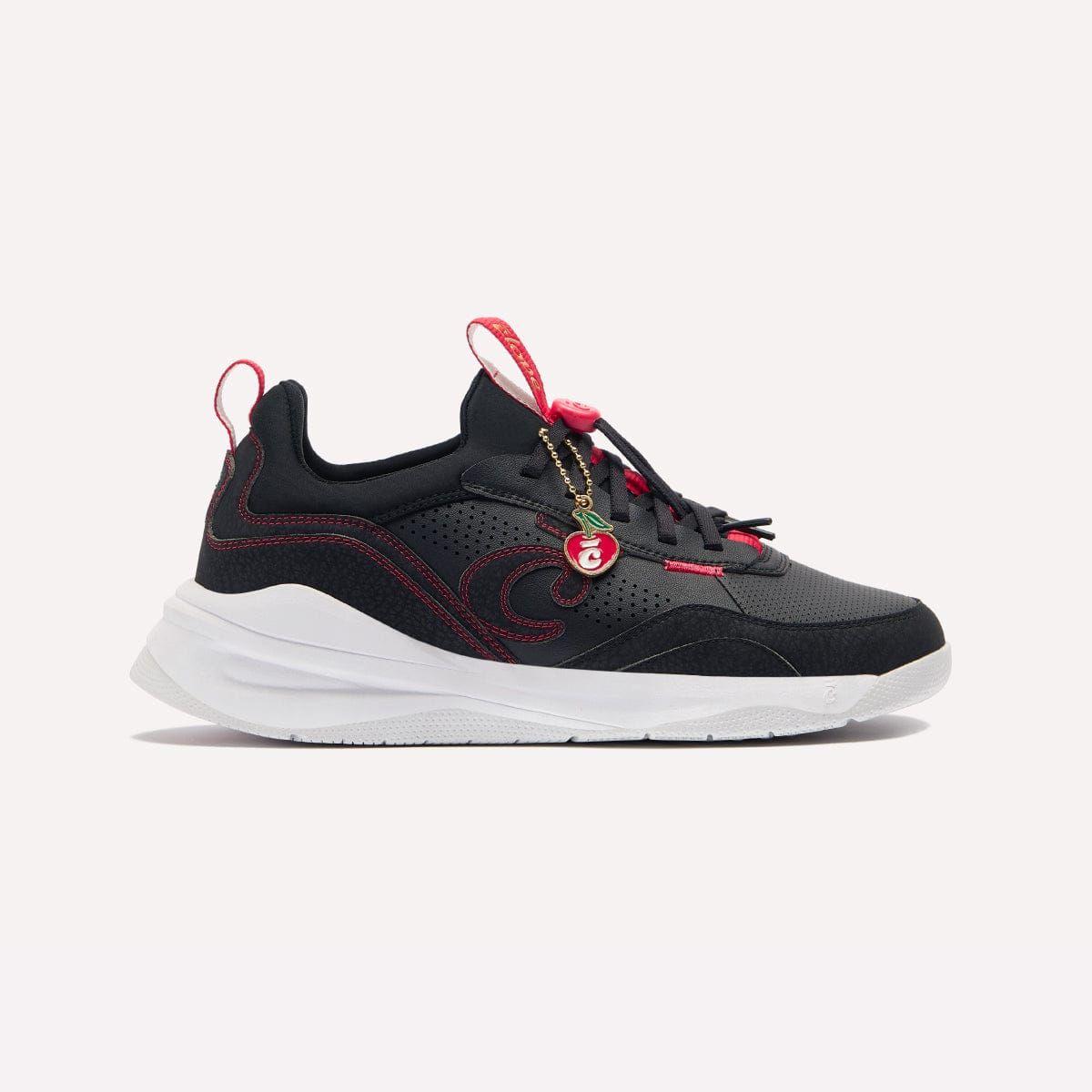 a black and red sneaker with a white sole