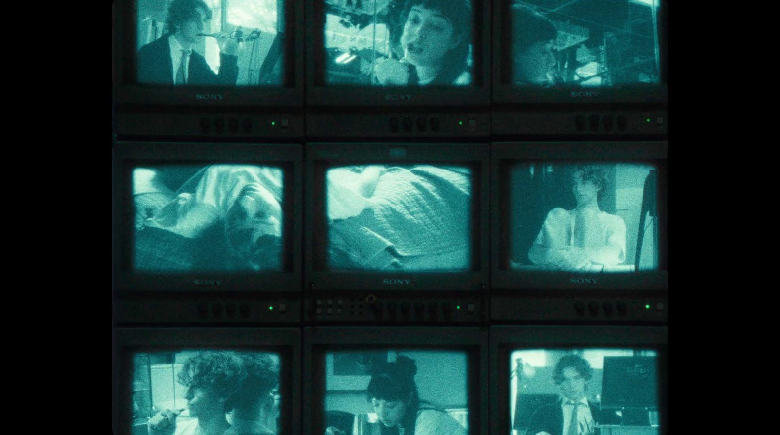 a series of televisions with people on them