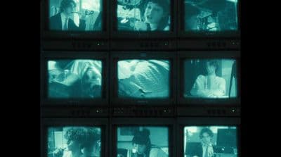 a series of televisions with people on them