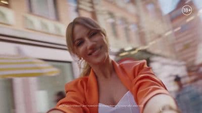 a woman taking a selfie with her cell phone