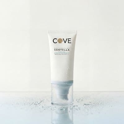 a tube of cream sitting on top of a table