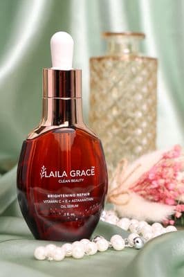 a close up of a bottle of perfume on a table