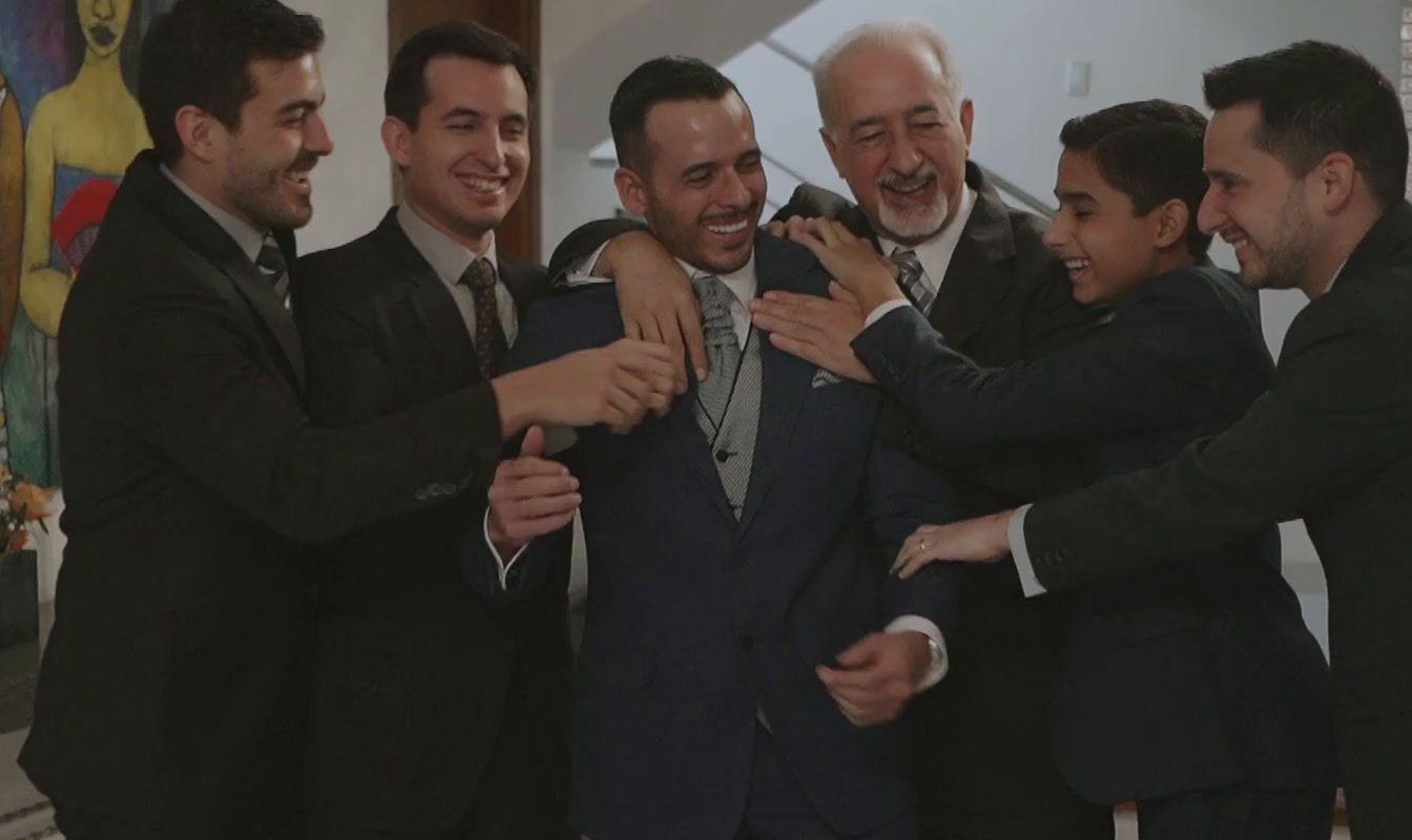 a group of men standing next to each other