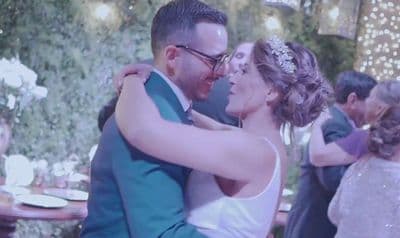 a bride and groom dance together at their wedding reception