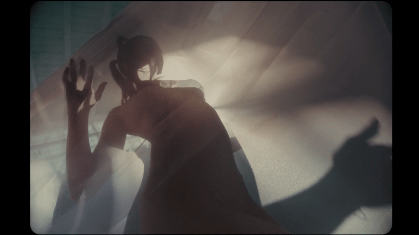 a woman standing in front of a curtain