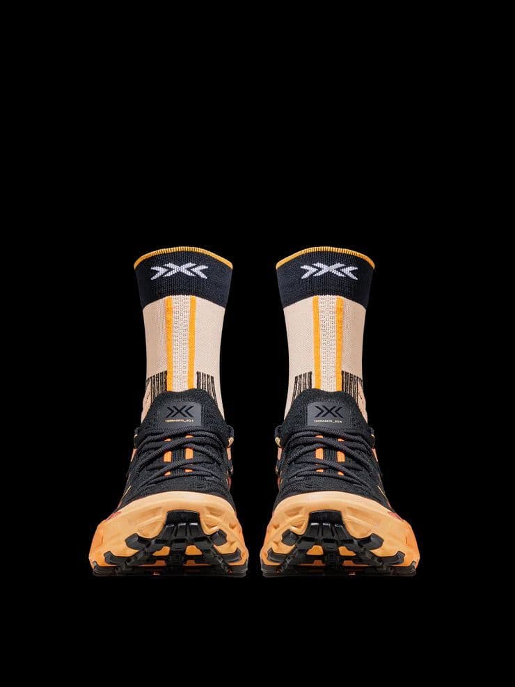 a pair of black and yellow sneakers