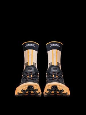 a pair of black and yellow sneakers