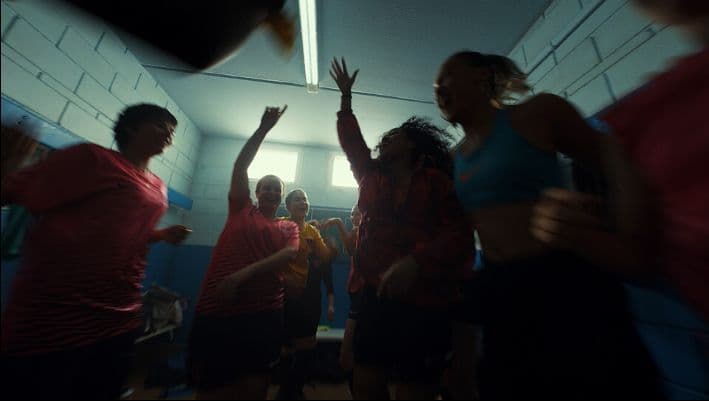 a group of people dancing in a room
