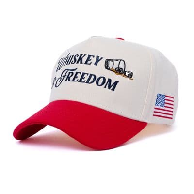 a white and red hat with a flag on it
