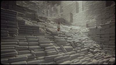 a person walking up a very large pile of bricks