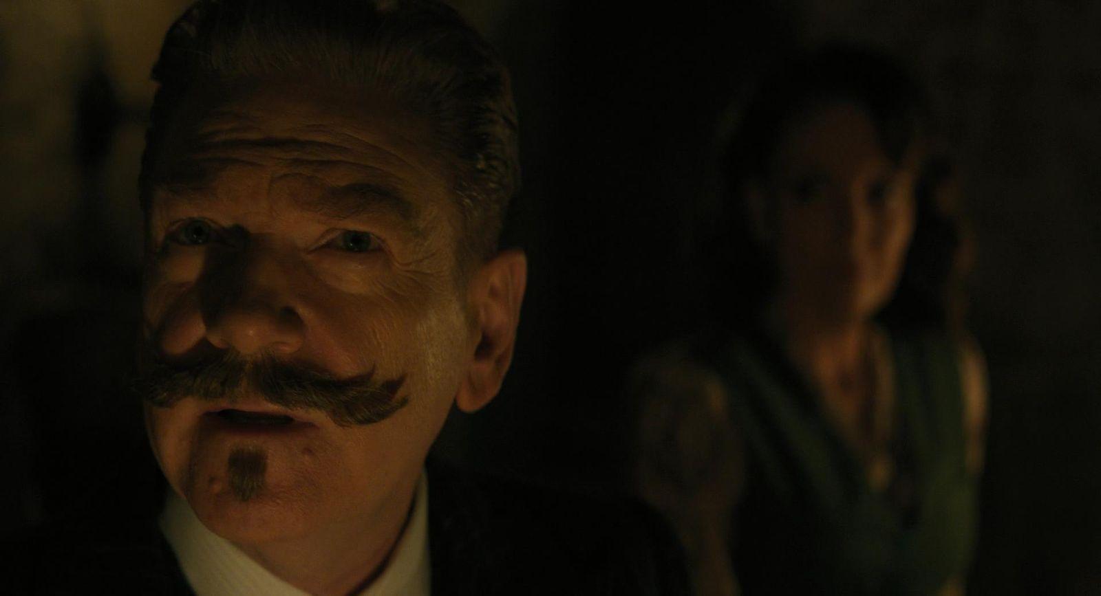 a man with a moustache on his face