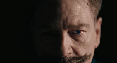 a man with a beard and blue eyes