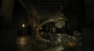 a metal bench in a dimly lit room