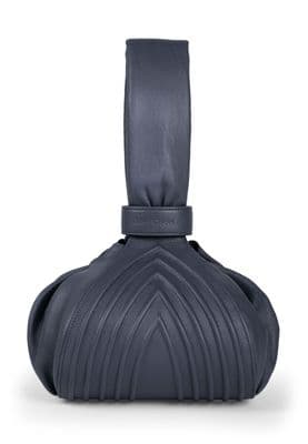 a blue handbag with a bow on the top of it