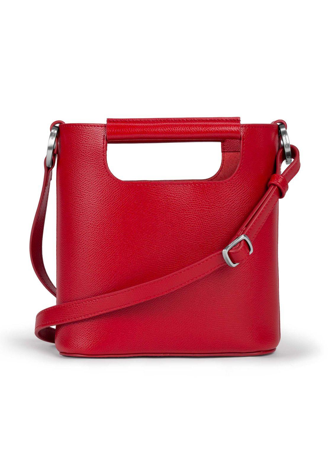 a red handbag with a metal handle