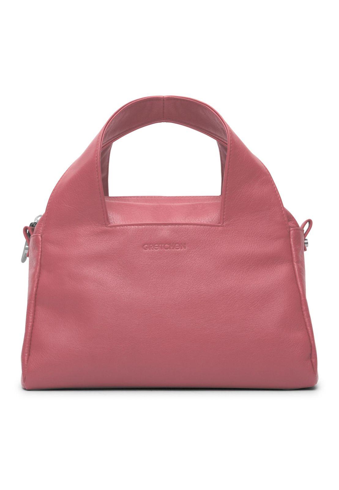 a pink handbag on a white background