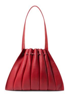 a red handbag on a white background