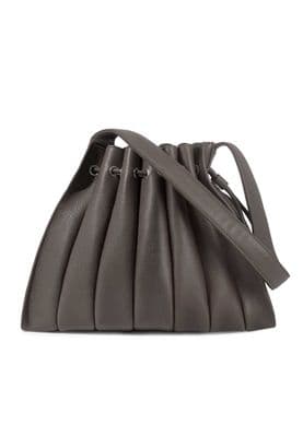 a gray handbag with a long strap