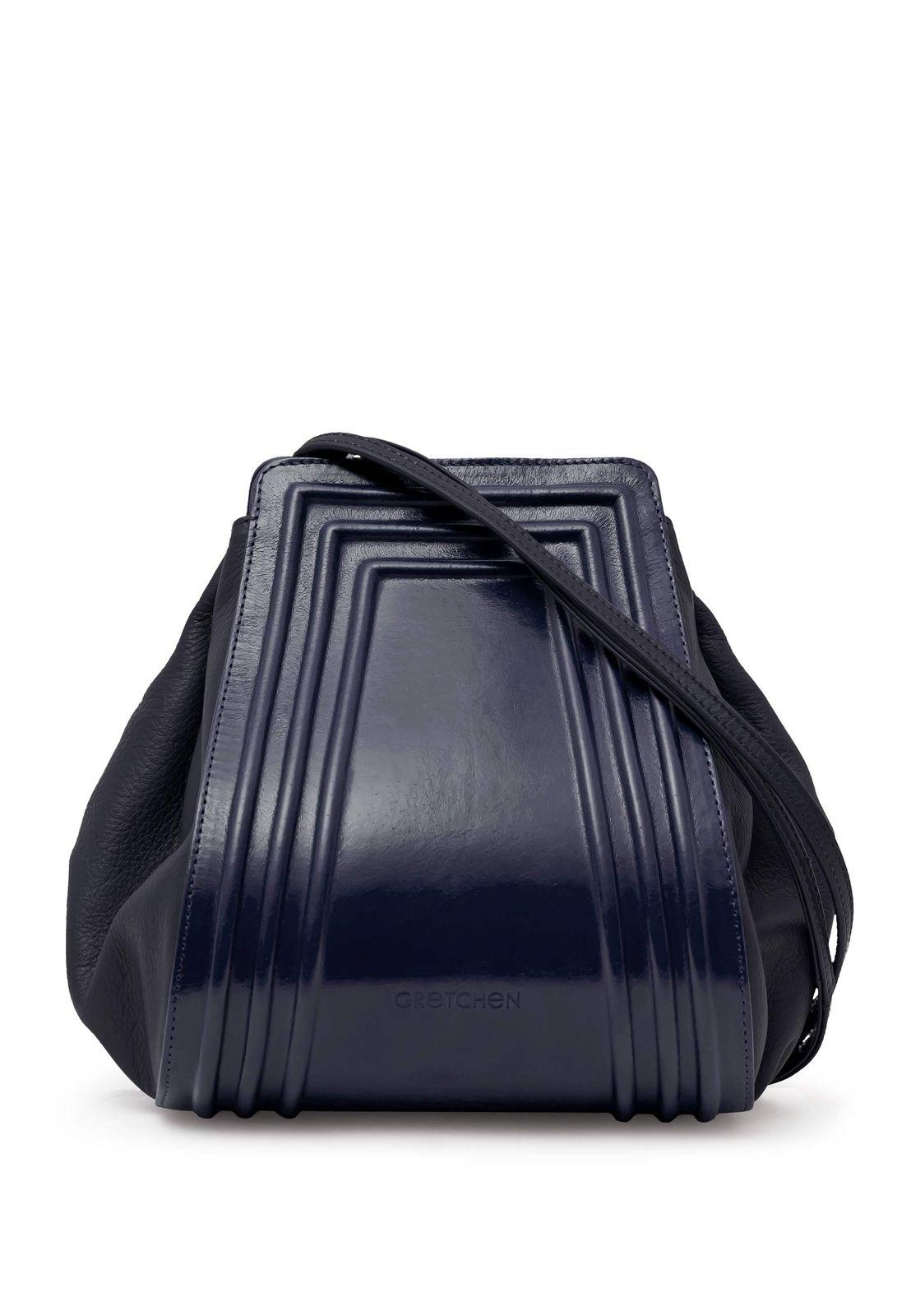 a blue handbag on a white background