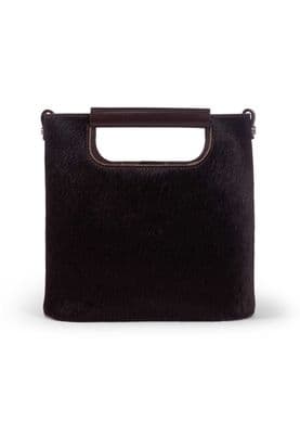 a black purse with a handle on a white background