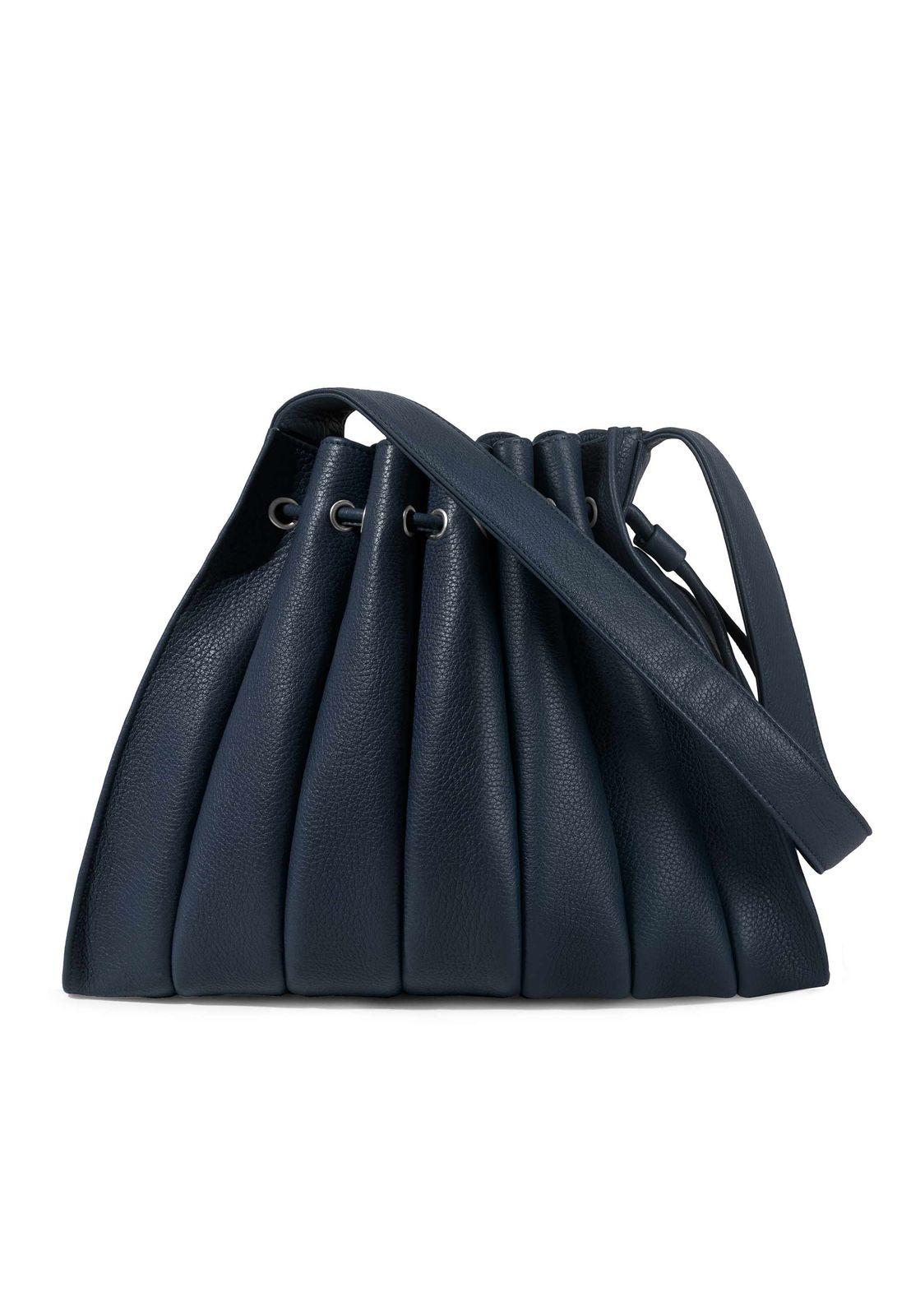 a blue handbag on a white background