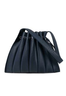 a blue handbag on a white background