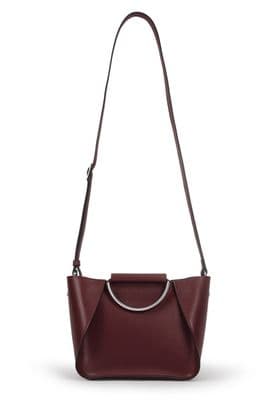a red handbag with a metal handle