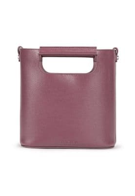a pink leather bag with a handle