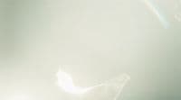 a blurry photo of a person holding a cell phone