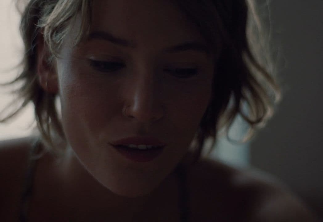 a close up of a person wearing a bra