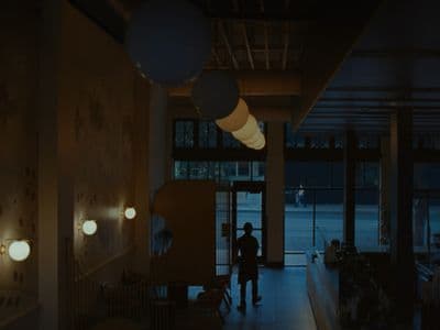 a person standing in a dimly lit room