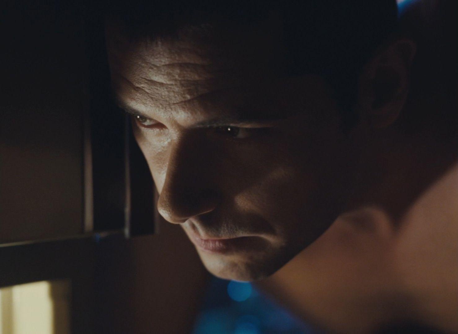 a close up of a person looking at something