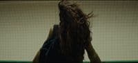 the back of a woman's head with long hair