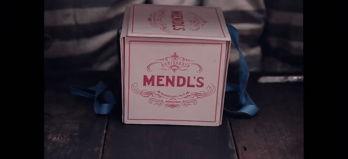 a pink box with the word mendl's on it